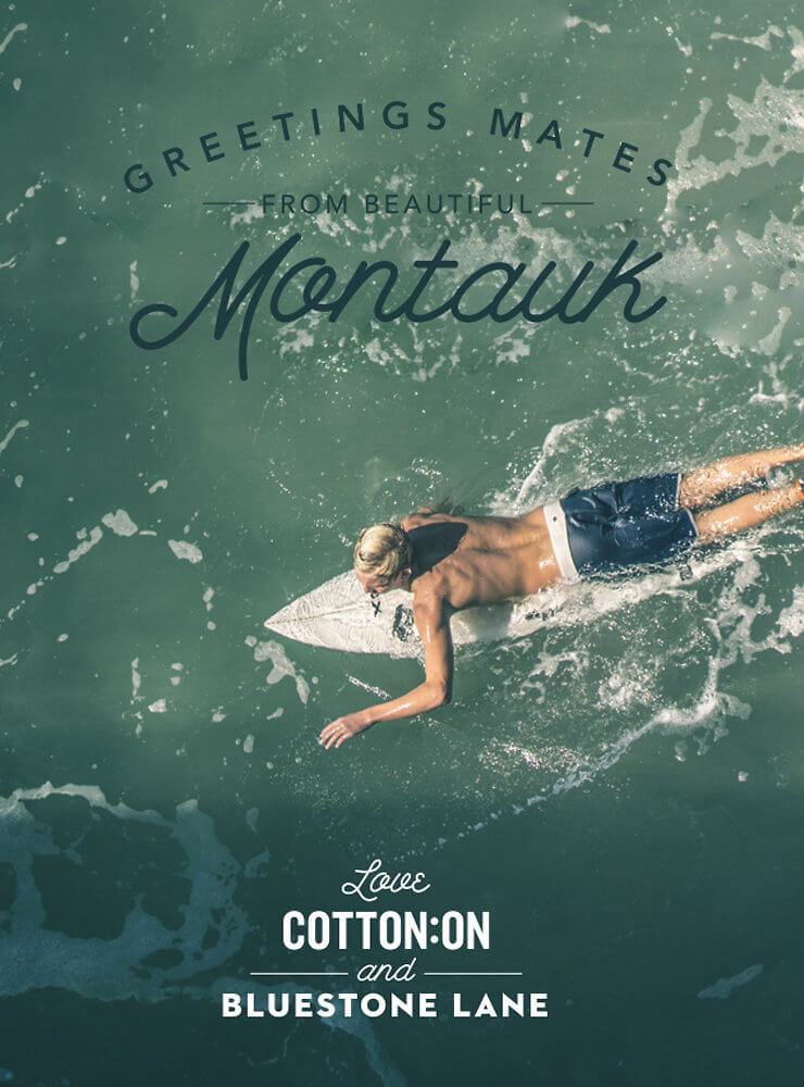 post card design of an aerial shot of a guy laying on a surf board in the water.