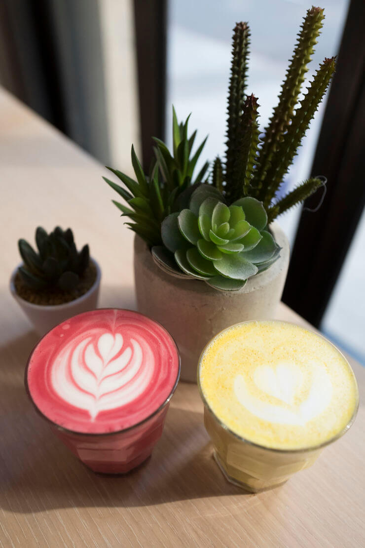 Beet Latte and Golden Latte in glass to stay cups 