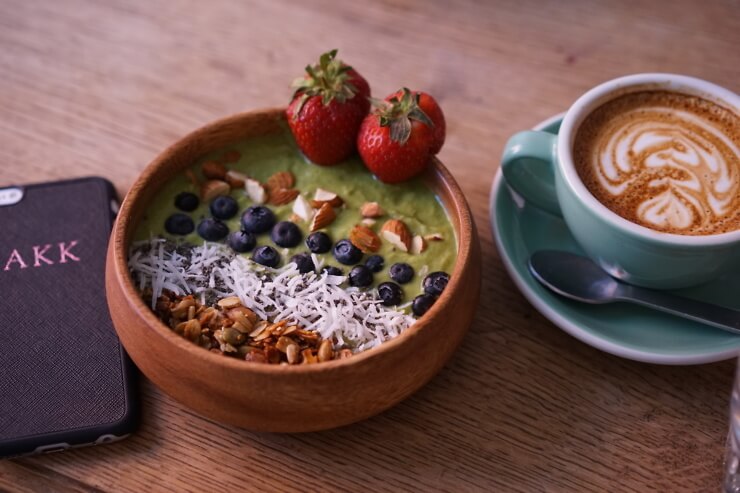 Brighton Smoothie Bowl topped with nuts and berries. 