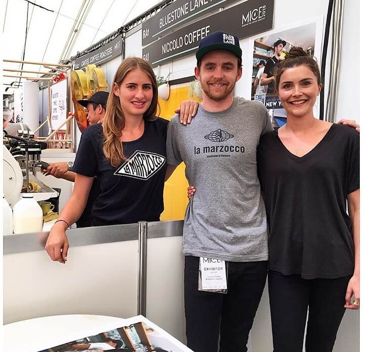Jai with two other Bluestone Lane Staff at MICE. 