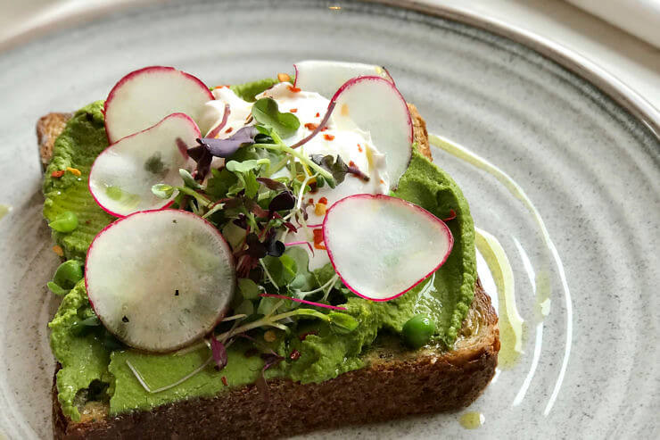 Pea and Mint Smash with radishes on top. 