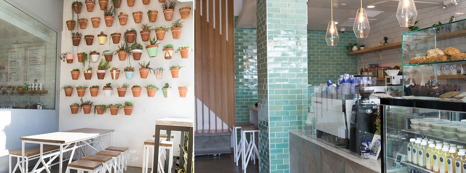 Interior of Bluestone Lane Santa Monica with teal and blue tiles along the wall and hanging pots with flowers.