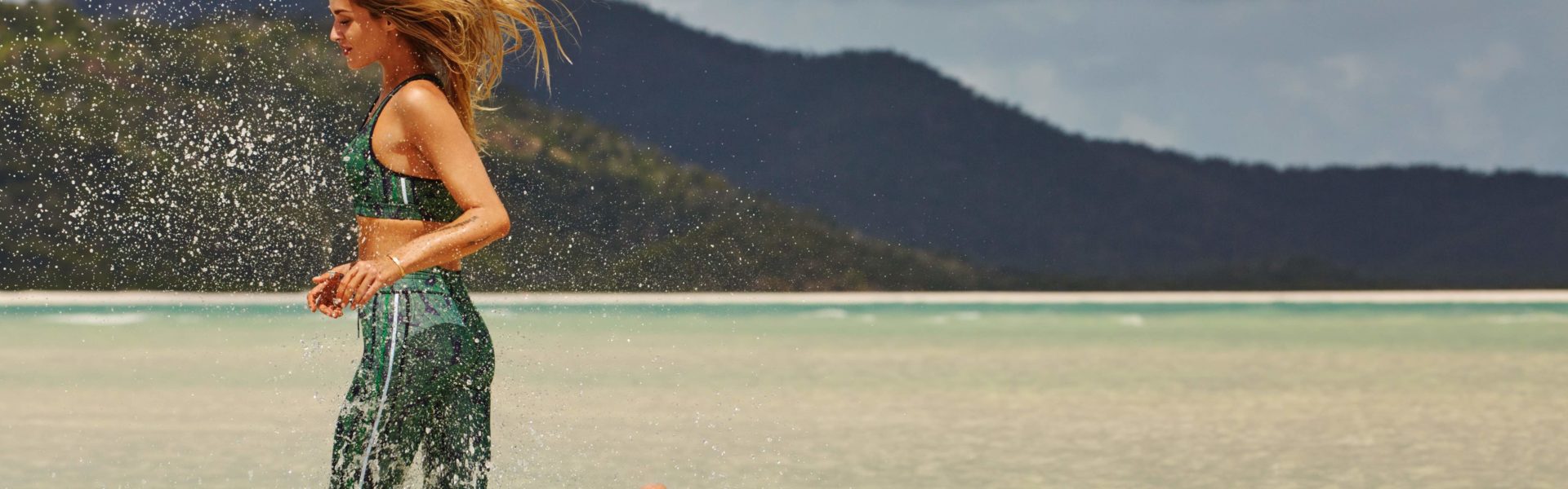 Woman running at the beach