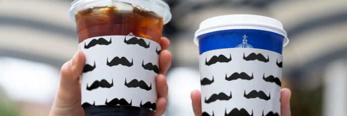 BL Coffee Cups with Movember Mustache Coffee Cup Sleeves.