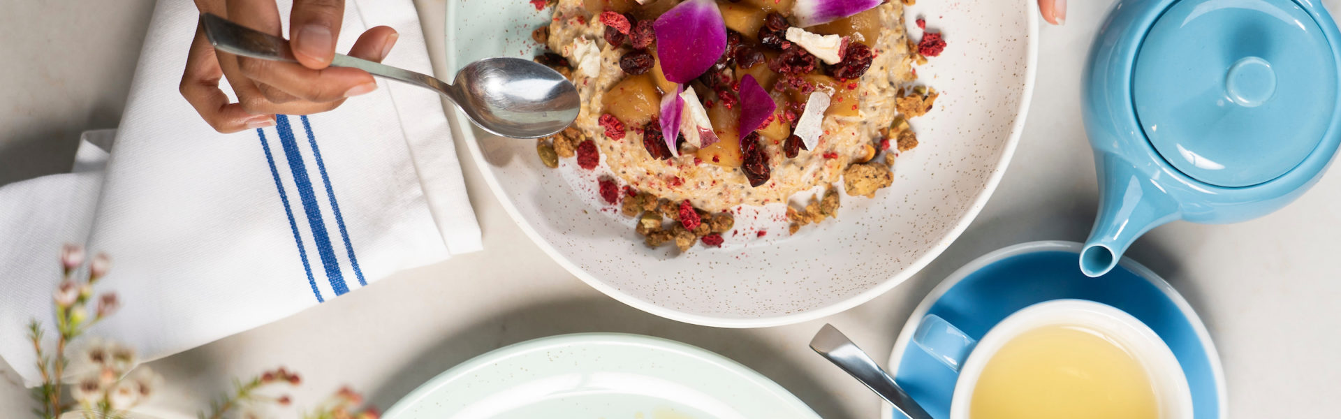 porridge and avocado smash from top down on a table.