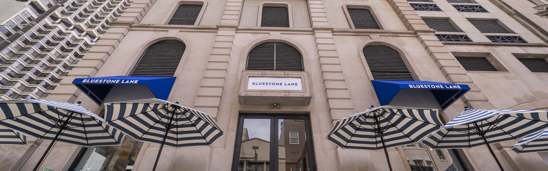 Exterior shot of Bluestone Lane's Walnut St store