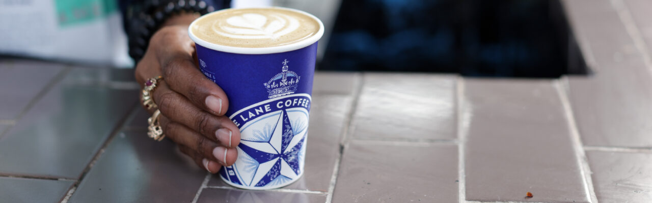 A takeaway Bluestone Lane latte