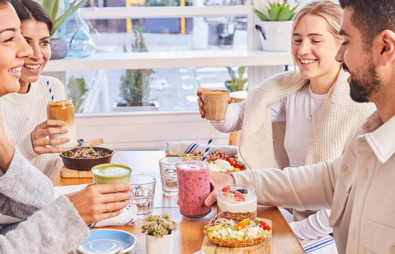 4 people enjoying a cafe meal