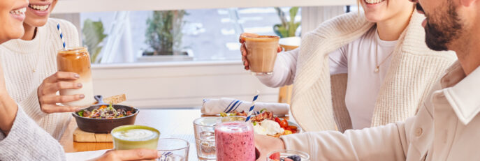 4 people enjoying a cafe meal